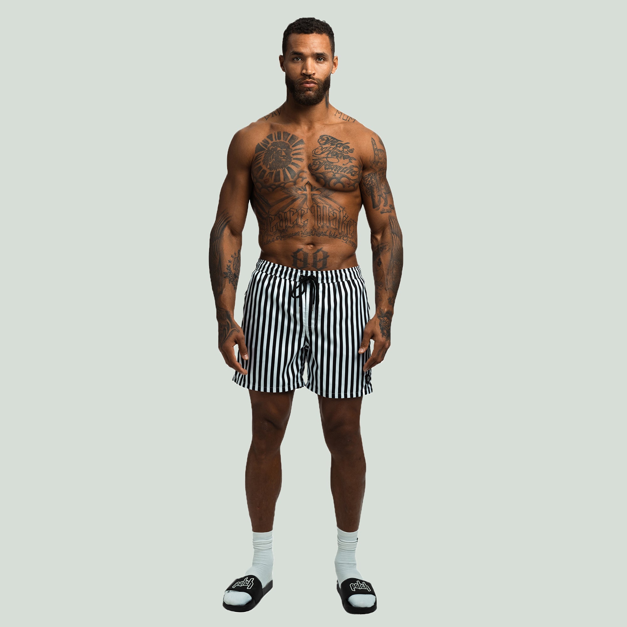 Front View of the Striped Color Patch Resort Shorts worn by a model